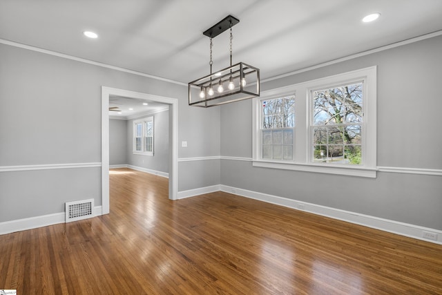 510 N Franklin Rd, Greenville, SC 29609 - unfurnished dining area featuring visible vents, wood finished floors, recessed lighting, crown molding, and baseboards