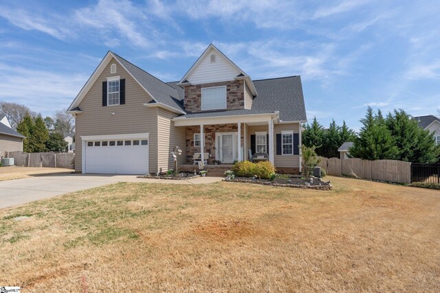 39 Santee Ct, Simpsonville, SC 29680 - traditional-style home with concrete driveway, an attached garage, fence, and a porch
