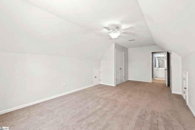 39 Santee Ct, Simpsonville, SC 29680 - additional living space featuring visible vents, baseboards, lofted ceiling, carpet floors, and a ceiling fan
