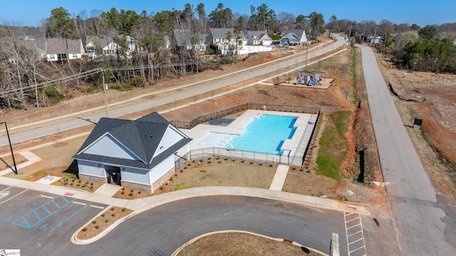 birds eye view of property with a residential view