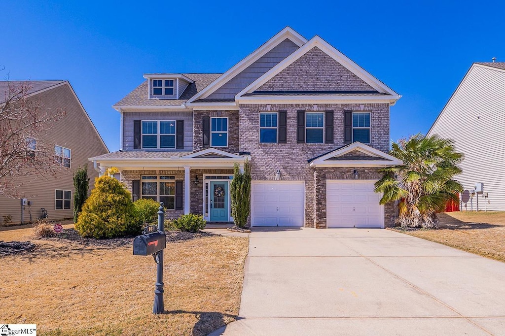 108 Sheepscot Ct, Simpsonville, SC 29681 - craftsman-style house featuring an attached garage and driveway