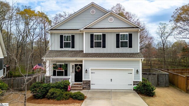 212 Donemere Way, Fountain Inn, SC 29644 - craftsman house with driveway, a shingled roof, an attached garage, and fence