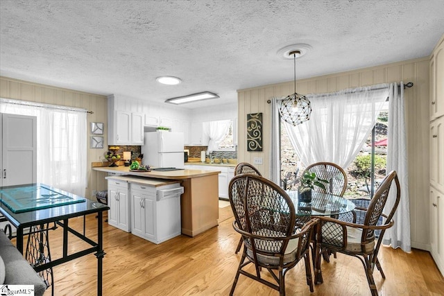 545 Long Reach Dr, Salem, SC 29676 - dining room with light wood-style floors and a healthy amount of sunlight