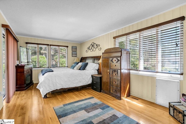 545 Long Reach Dr, Salem, SC 29676 - bedroom featuring a textured ceiling, crown molding, and wood finished floors