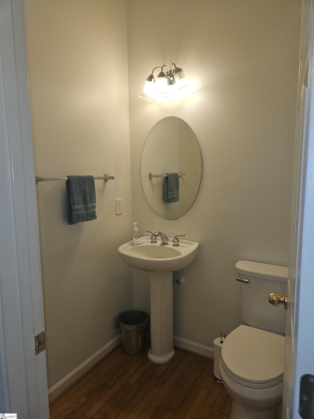 6 Silverthorn Ct, Simpsonville, SC 29681 - bathroom with wood finished floors, baseboards, toilet, and a sink