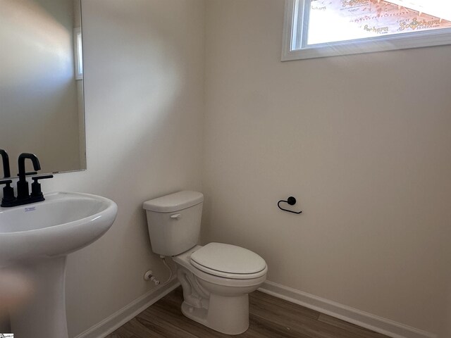 127 Hunter Ridge Dr Lot 75, Boiling Springs, SC 29316 - bathroom featuring a sink, toilet, baseboards, and wood finished floors