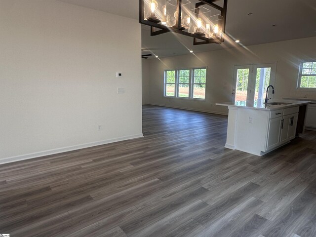 127 Hunter Ridge Dr Lot 75, Boiling Springs, SC 29316 - kitchen featuring pendant lighting, a sink, open floor plan, dark wood-type flooring, and white cabinets