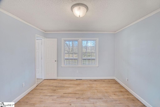 139 Randolph Ct, Woodruff, SC 29388 - spare room with ornamental molding, baseboards, and wood finished floors