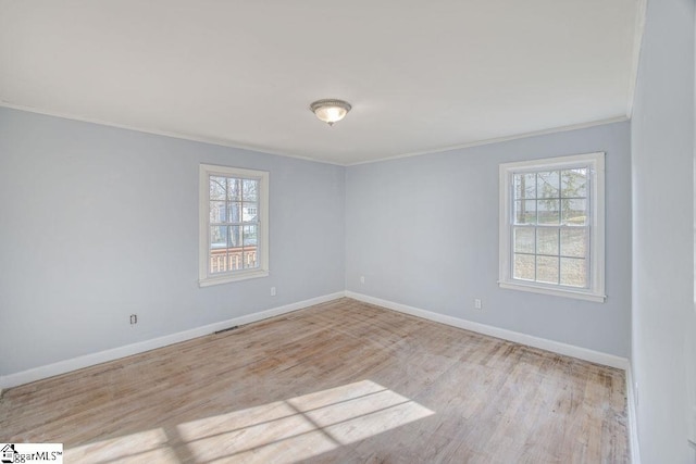 139 Randolph Ct, Woodruff, SC 29388 - spare room with a healthy amount of sunlight, baseboards, and wood finished floors