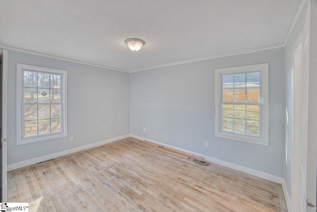 139 Randolph Ct, Woodruff, SC 29388 - spare room with a textured ceiling, wood finished floors, baseboards, and ornamental molding