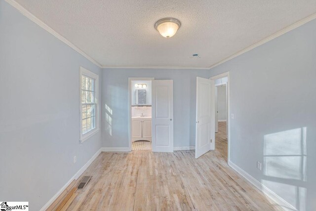 139 Randolph Ct, Woodruff, SC 29388 - unfurnished room with baseboards, light wood-style floors, visible vents, and ornamental molding