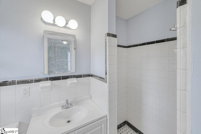 139 Randolph Ct, Woodruff, SC 29388 - bathroom with a wainscoted wall, vanity, and tile walls