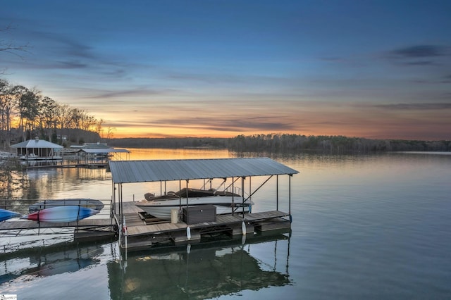 dock area featuring a water view and boat lift