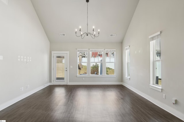 31 Creekhaven Ln, Taylors, SC 29687 - interior space featuring dark wood finished floors, an inviting chandelier, baseboards, and visible vents