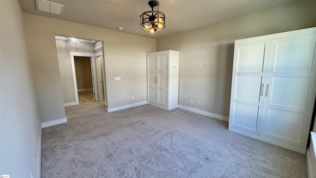 31 Creekhaven Ln, Taylors, SC 29687 - unfurnished bedroom with visible vents, baseboards, and light colored carpet