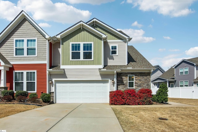 31 Creekhaven Ln, Taylors, SC 29687 - craftsman inspired home with a front yard, fence, driveway, a garage, and board and batten siding