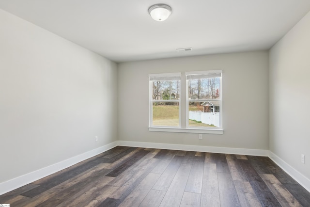31 Creekhaven Ln, Taylors, SC 29687 - empty room featuring visible vents, baseboards, and dark wood-style floors