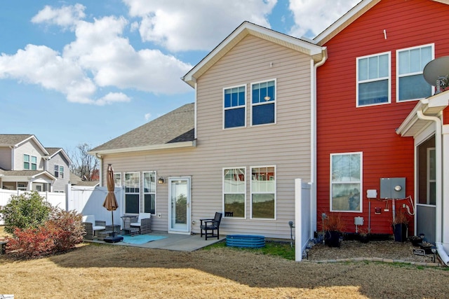 31 Creekhaven Ln, Taylors, SC 29687 - rear view of house with a yard, a patio area, fence, and roof with shingles
