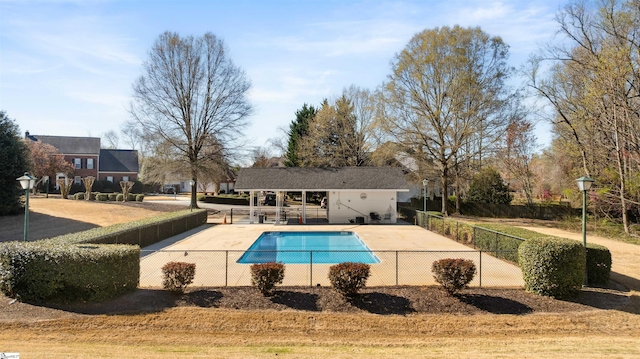 view of pool with a patio, fence, and a fenced in pool