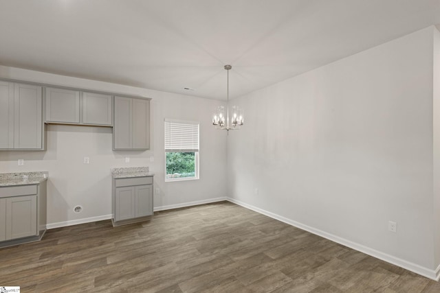 200 Clinkscales Rd Lot 37, Anderson, SC 29624 - kitchen with gray cabinets, a chandelier, and dark wood-type flooring