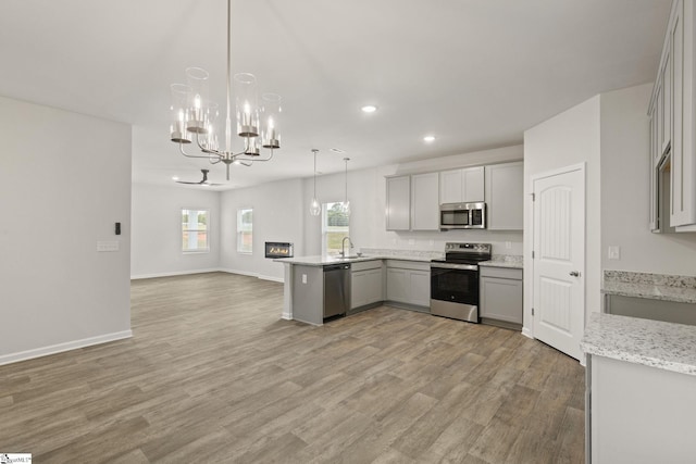 200 Clinkscales Rd Lot 37, Anderson, SC 29624 - kitchen with stainless steel appliances, gray cabinetry, a chandelier, recessed lighting, and a sink