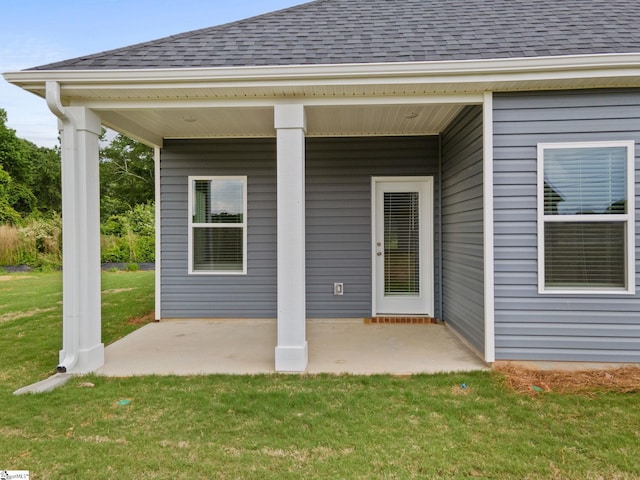 200 Clinkscales Rd Lot 37, Anderson, SC 29624 - doorway to property featuring a shingled roof, a patio, and a yard