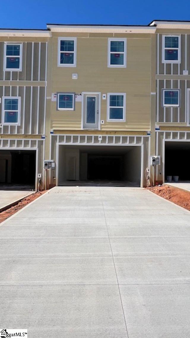 35 Leander Dr, Greer, SC 29651 - view of front facade featuring a garage and concrete driveway