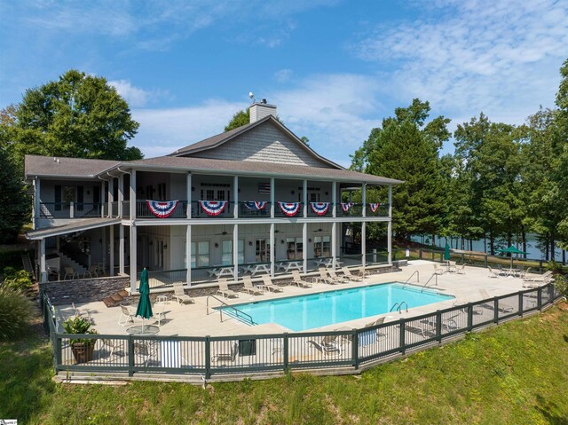 1230 Melton Rd Unit 101, West Union, SC 29696 - back of house featuring fence, a chimney, a patio area, and a community pool