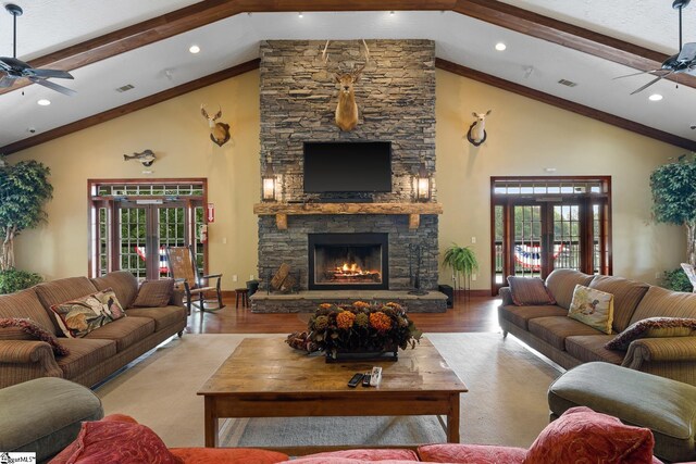 1230 Melton Rd Unit 101, West Union, SC 29696 - living room with beamed ceiling, a fireplace, wood finished floors, and a ceiling fan