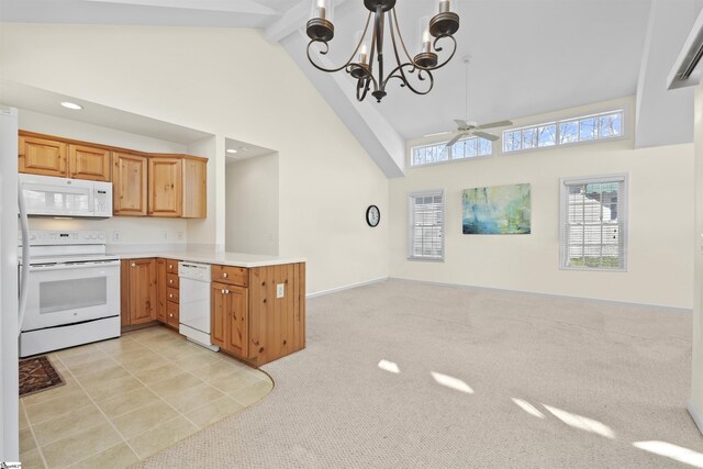 1230 Melton Rd Unit 101, West Union, SC 29696 - kitchen with high vaulted ceiling, light countertops, a peninsula, white appliances, and beam ceiling