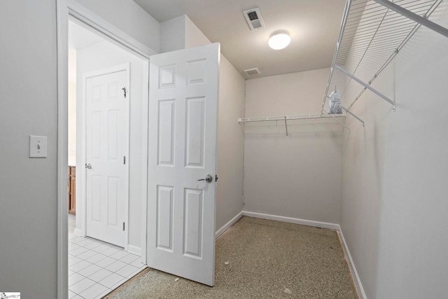 spacious closet with visible vents