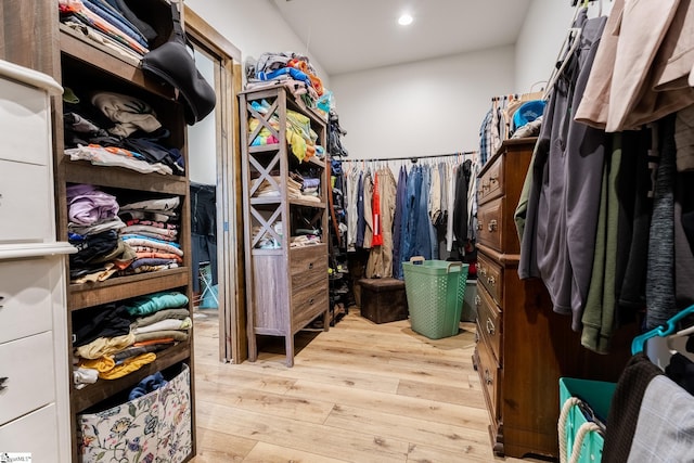 spacious closet featuring hardwood / wood-style floors