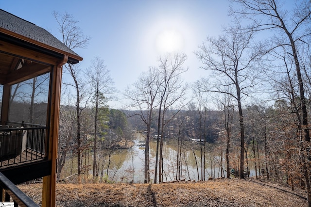 water view with a wooded view