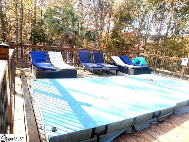 deck with a jacuzzi