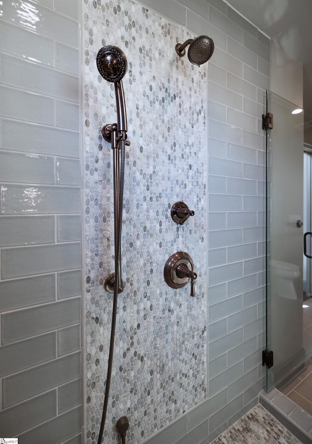 bathroom featuring a stall shower