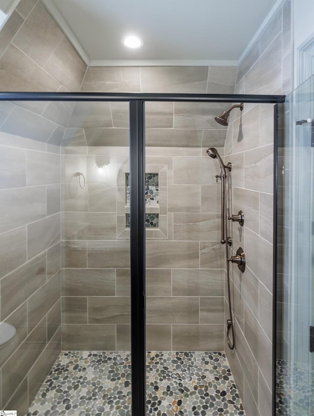 bathroom featuring a shower stall