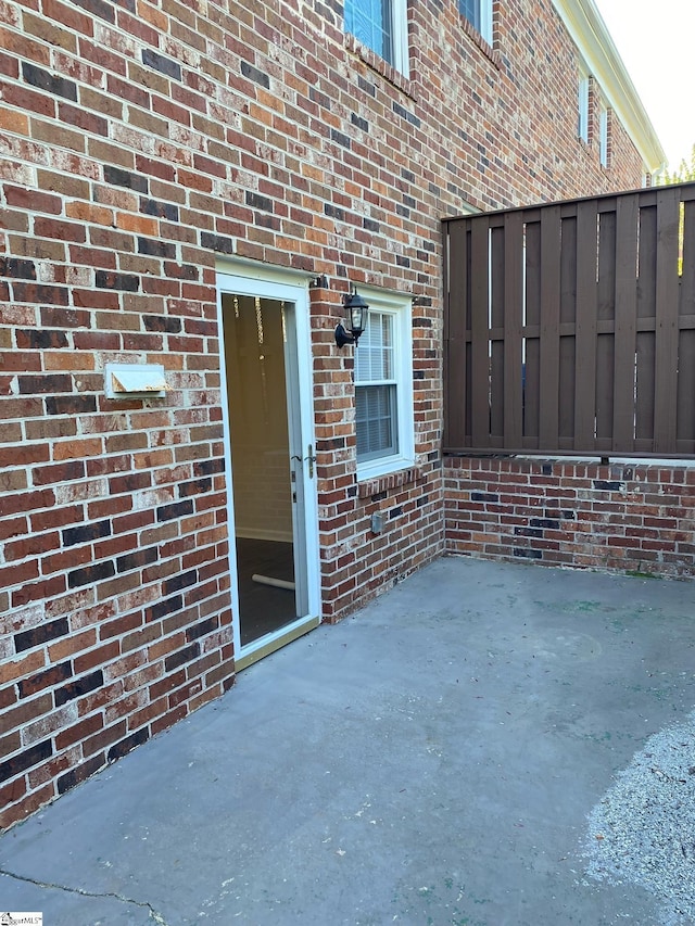 view of patio with fence