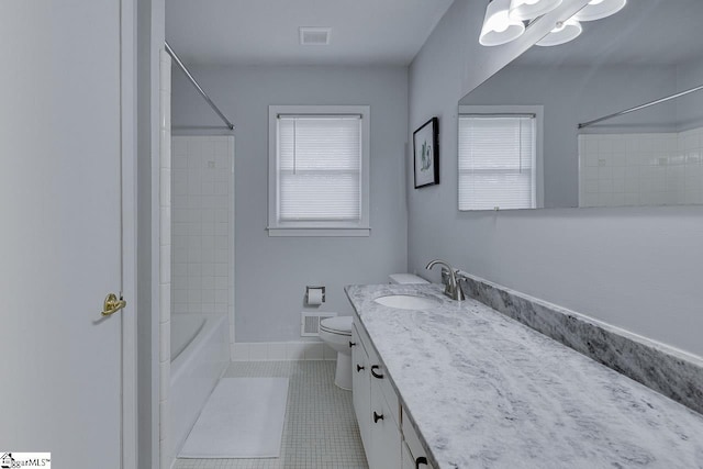 bathroom with tile patterned floors, toilet, vanity, shower / bathing tub combination, and visible vents