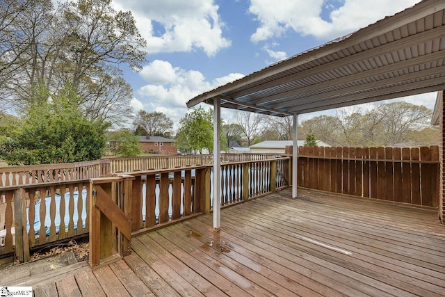 wooden deck featuring fence