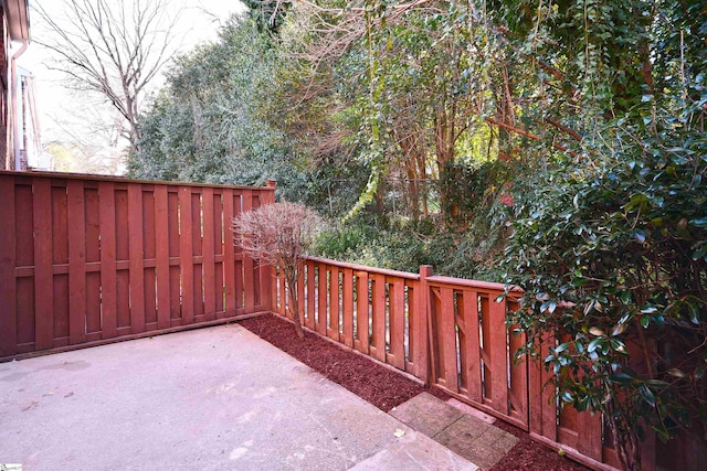 view of patio with fence