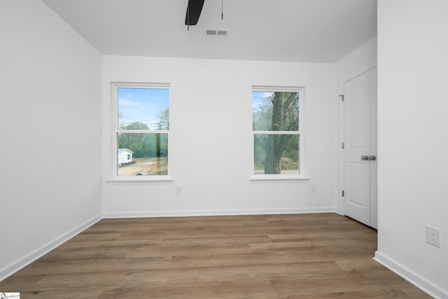 14 Polk Blvd, Greenville, SC 29611 - unfurnished room with baseboards, visible vents, wood finished floors, and ceiling fan