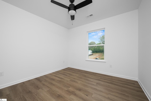 14 Polk Blvd, Greenville, SC 29611 - unfurnished room with baseboards, visible vents, dark wood-type flooring, and a ceiling fan