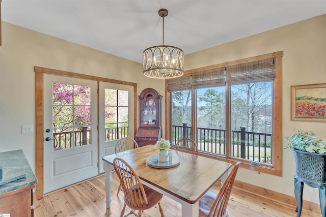 511 Palmer Way, Sunset, SC 29685 - dining space featuring a chandelier and light wood-style floors