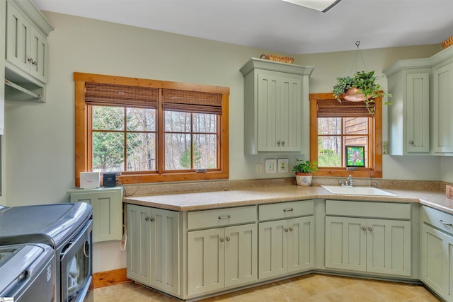 511 Palmer Way, Sunset, SC 29685 - laundry area with independent washer and dryer, a sink, and cabinet space
