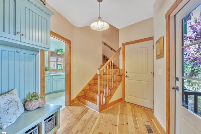 511 Palmer Way, Sunset, SC 29685 - foyer featuring baseboards, stairs, visible vents, and light wood-style flooring