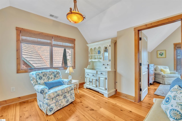 511 Palmer Way, Sunset, SC 29685 - living area featuring baseboards, lofted ceiling, visible vents, and light wood-style flooring