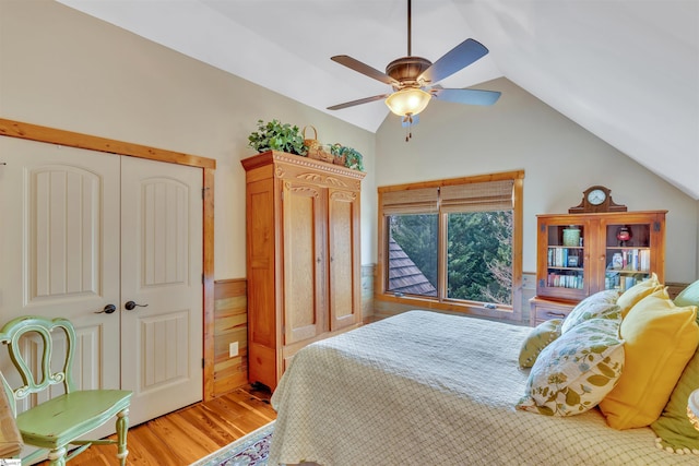 511 Palmer Way, Sunset, SC 29685 - bedroom featuring lofted ceiling, ceiling fan, light wood-style floors, and a wainscoted wall
