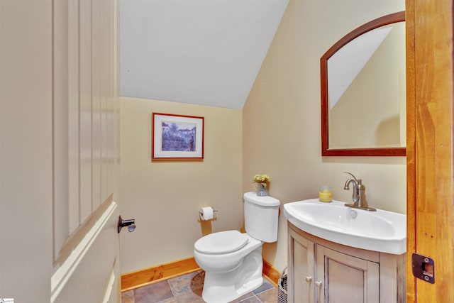 511 Palmer Way, Sunset, SC 29685 - half bathroom with baseboards, vaulted ceiling, toilet, and vanity