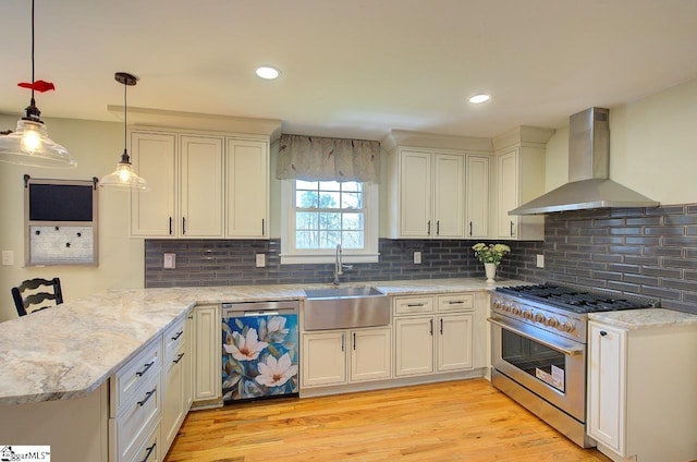 411 Westcliffe Way, Greenville, SC 29611 - kitchen featuring a peninsula, stainless steel appliances, a sink, light wood-type flooring, and wall chimney range hood