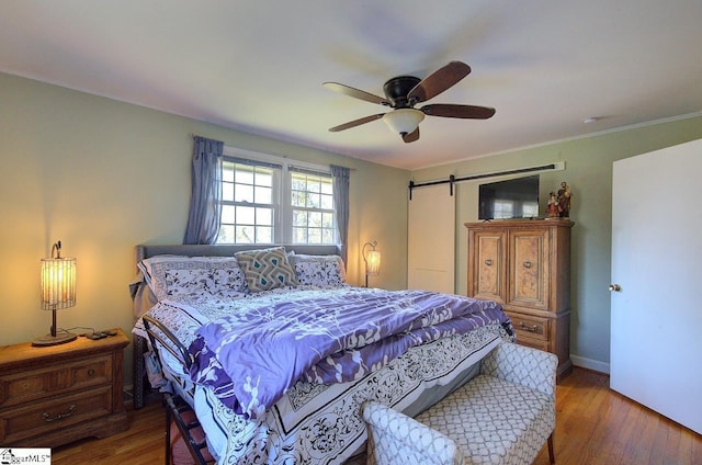 411 Westcliffe Way, Greenville, SC 29611 - bedroom featuring baseboards, crown molding, wood finished floors, and a ceiling fan